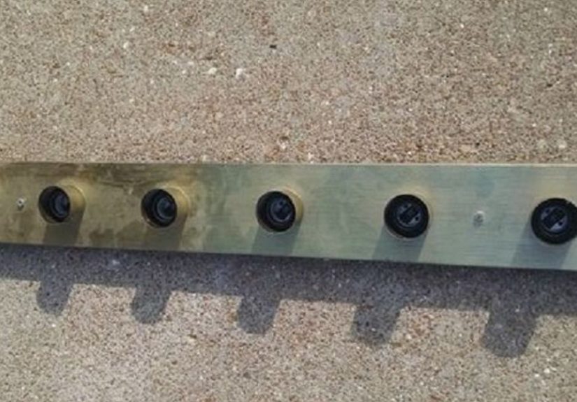 From Fugly to Vintage Industrial: Brass Hollywood Strip Bulb Light